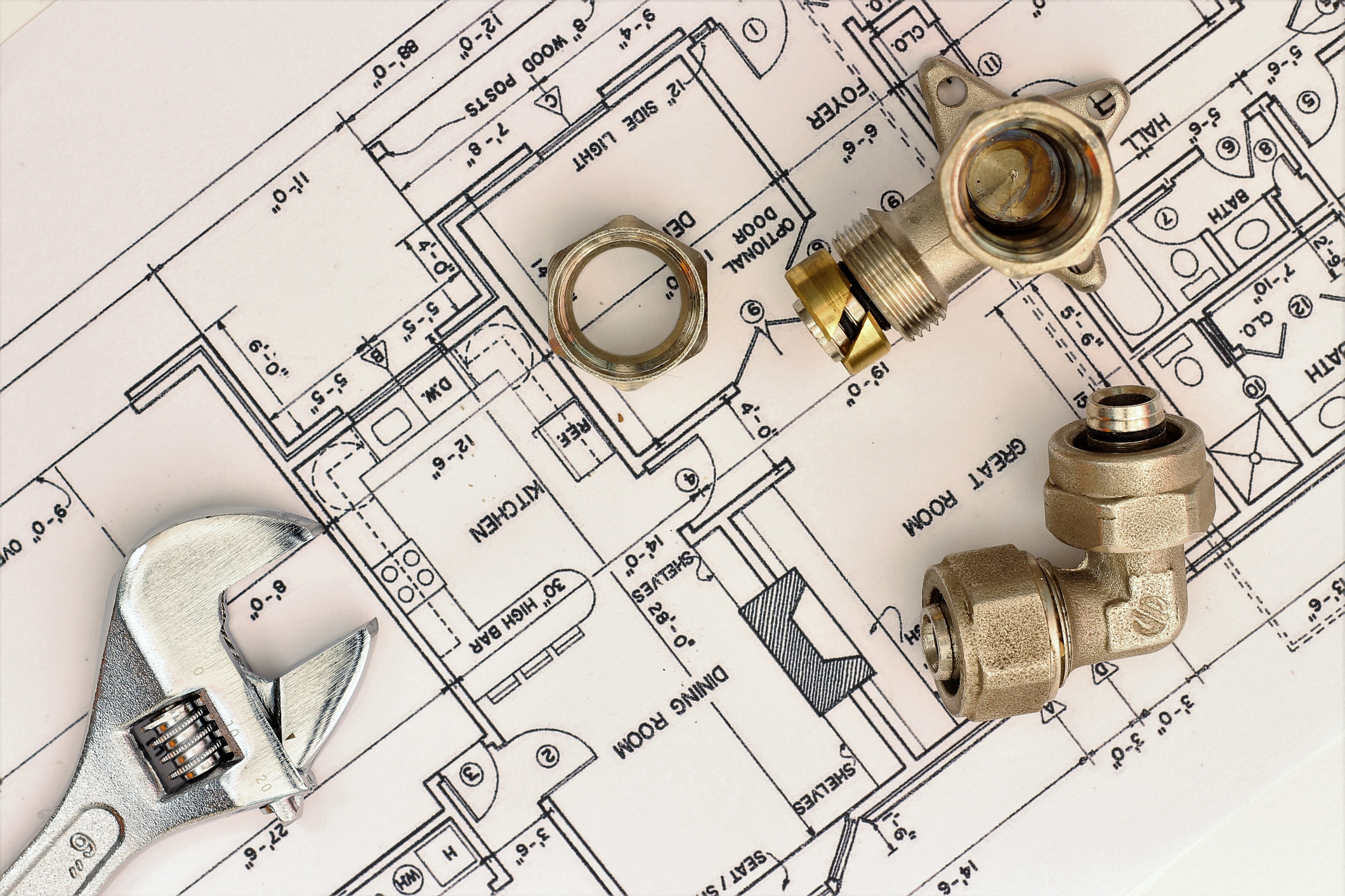 Plumber installing tankless water heater